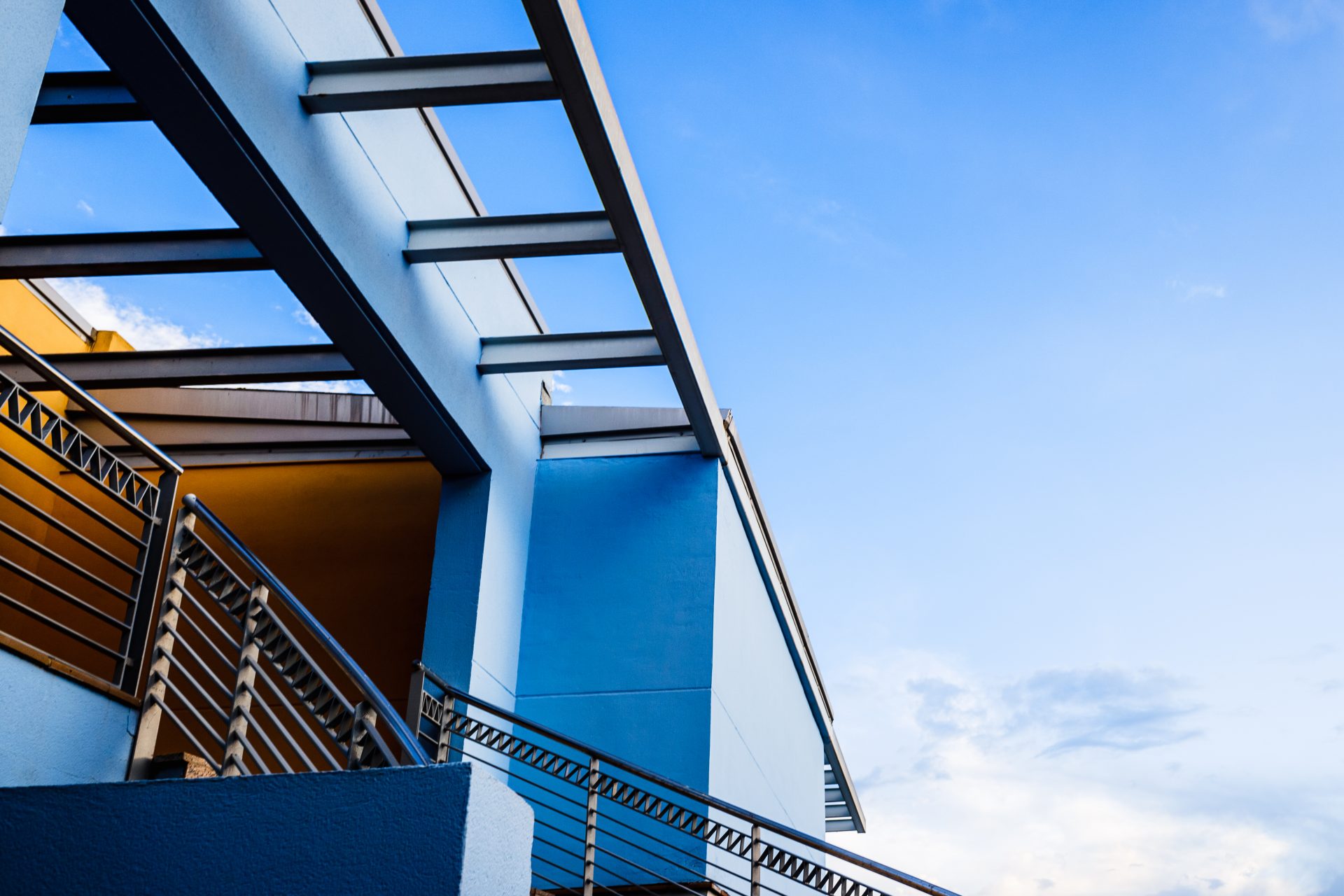 staircase-and-terrace-of-a-building-with-blue-and-2026-03-10-03-11-45-utc